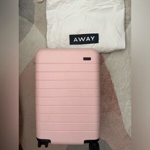 Away Travel carry on in blush pink